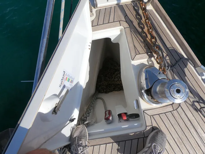  Yacht Photos Pics 2015 Jeanneau 57 yacht anchor locker with chain and winch on deck.