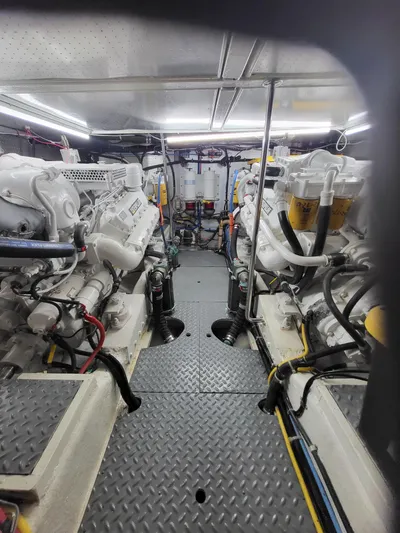 Dunn It Again Yacht Photos Pics Engine room of 1997 McKinna 48' Pilot House with dual engines and equipment.