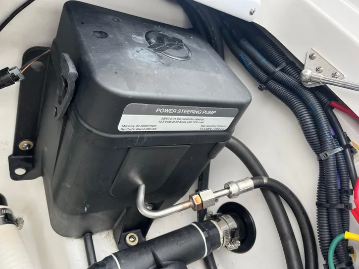  Yacht Photos Pics 2023 Blackfin 272 DC power steering pump with connected cables and hoses.