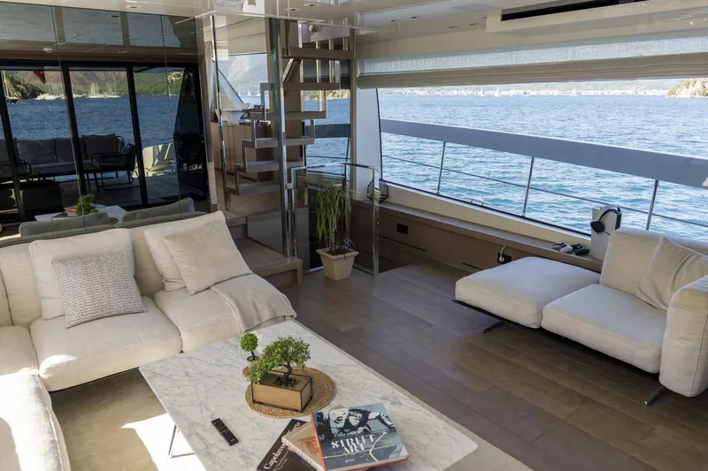  Yacht Photos Pics Luxurious interior of 2023 Sanlorenzo SX76 yacht with modern furnishings and ocean view.