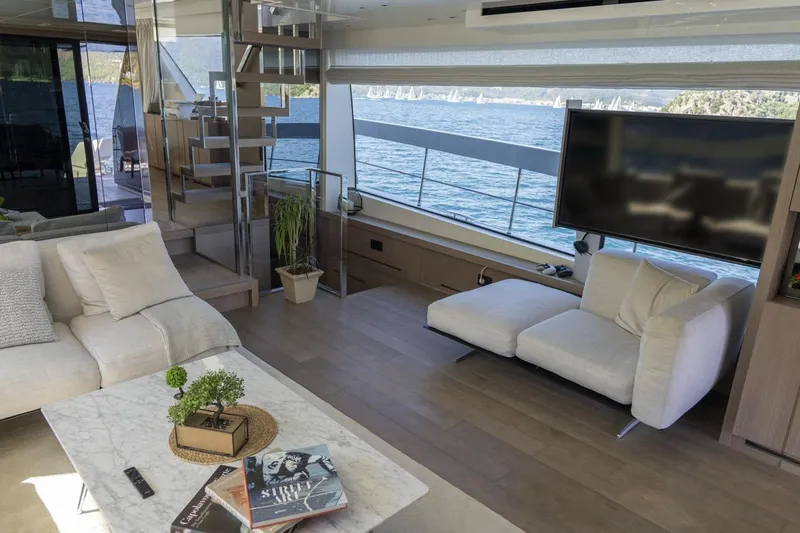 Yacht Photos Pics Luxurious interior of 2023 Sanlorenzo SX76 yacht with modern furnishings and ocean view.