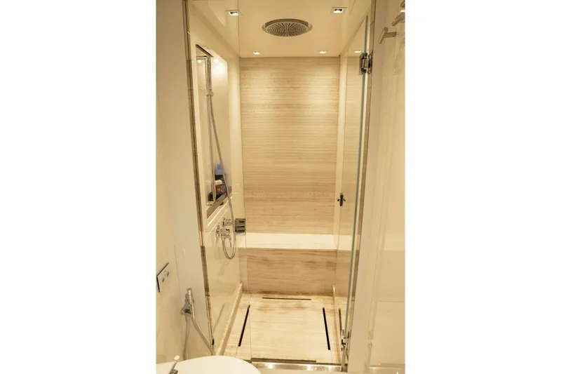  Yacht Photos Pics Luxurious bathroom interior of 2023 Sanlorenzo SX76 yacht with modern shower design.