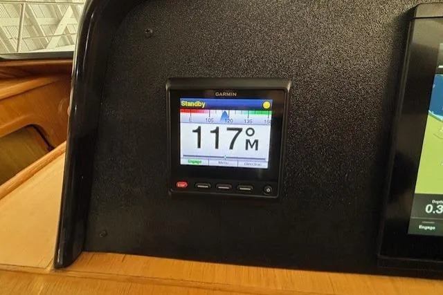 Aqua Billy Yacht Photos Pics Garmin navigation display showing 117 degrees on a 1995 Symbol Super Sedan dashboard.