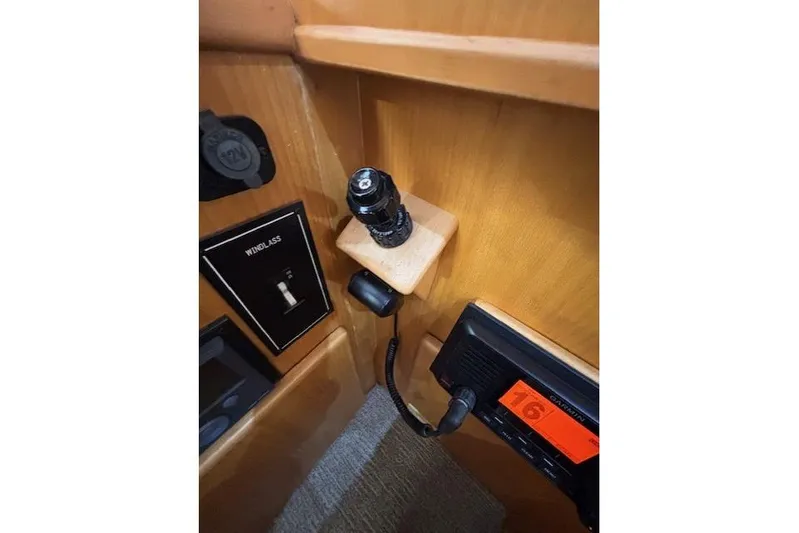 Aqua Billy Yacht Photos Pics Interior of a 1995 Symbol Super Sedan with control panel and radio equipment.