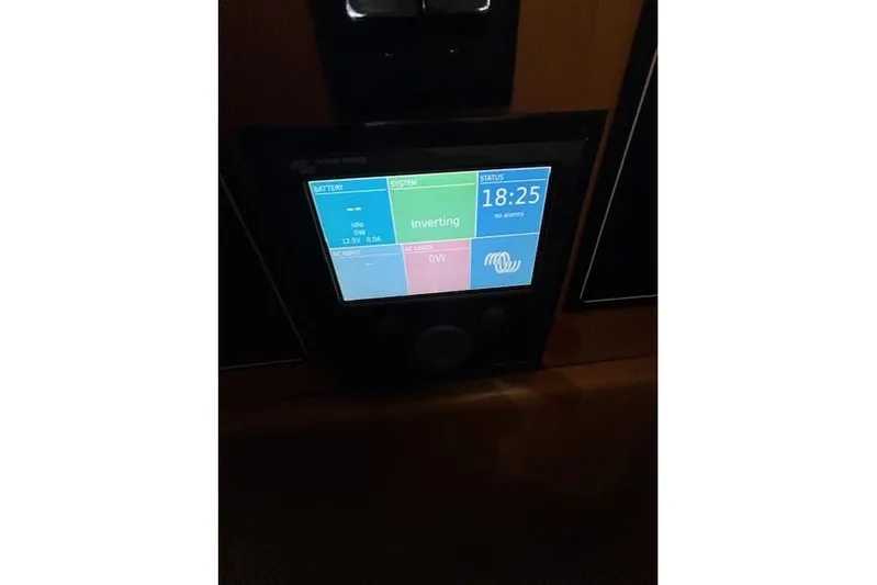 Aqua Billy Yacht Photos Pics Touchscreen display in a 1995 Symbol Super Sedan showing battery and system status.