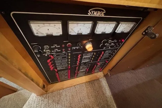 Aqua Billy Yacht Photos Pics Control panel of a 1995 Symbol Super Sedan with gauges and switches.