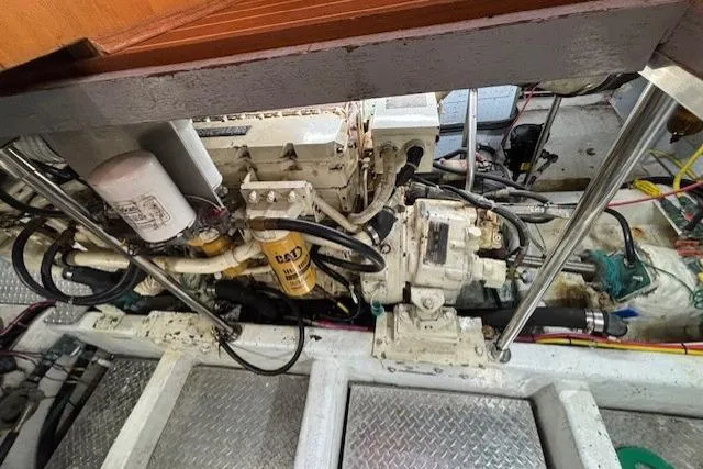 Aqua Billy Yacht Photos Pics Engine compartment of a 1995 Symbol Super Sedan, showcasing mechanical components and wiring.