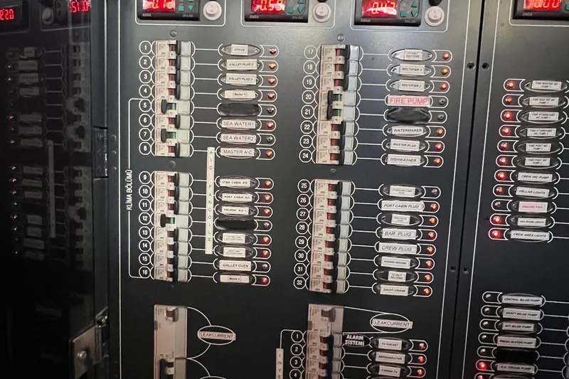  Yacht Photos Pics Control panel of the 1993 Custom Sailing Yacht Ocean Pure, featuring labeled switches and indicators.