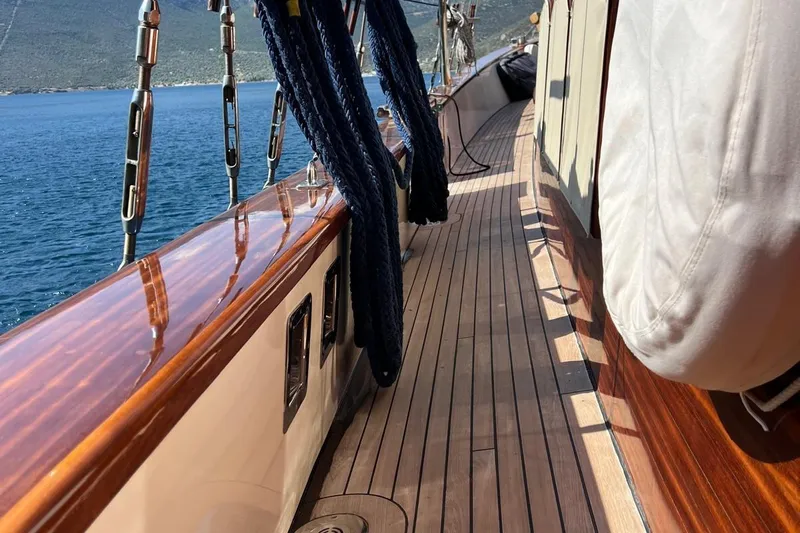  Yacht Photos Pics Polished deck of 1993 Custom Sailing Yacht Ocean Pure with scenic ocean view.