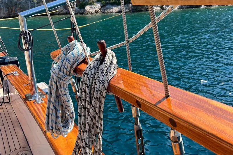  Yacht Photos Pics Polished wood deck of 1993 Custom Sailing Yacht Ocean Pure with coiled ropes.