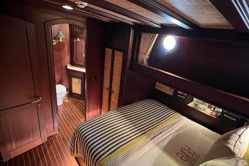  Yacht Photos Pics Luxurious cabin interior of 1993 Custom Sailing Yacht Ocean Pure with elegant wood finishes.