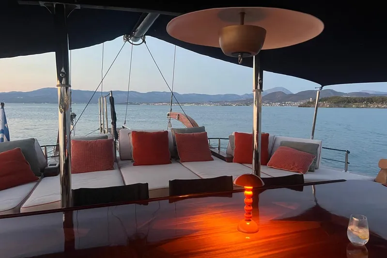  Yacht Photos Pics Luxurious 1993 Custom Sailing Yacht Ocean Pure with elegant deck seating and scenic ocean view.