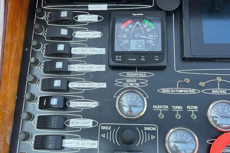  Yacht Photos Pics Control panel of 1993 Custom Sailing Yacht Ocean Pure with various switches and gauges.