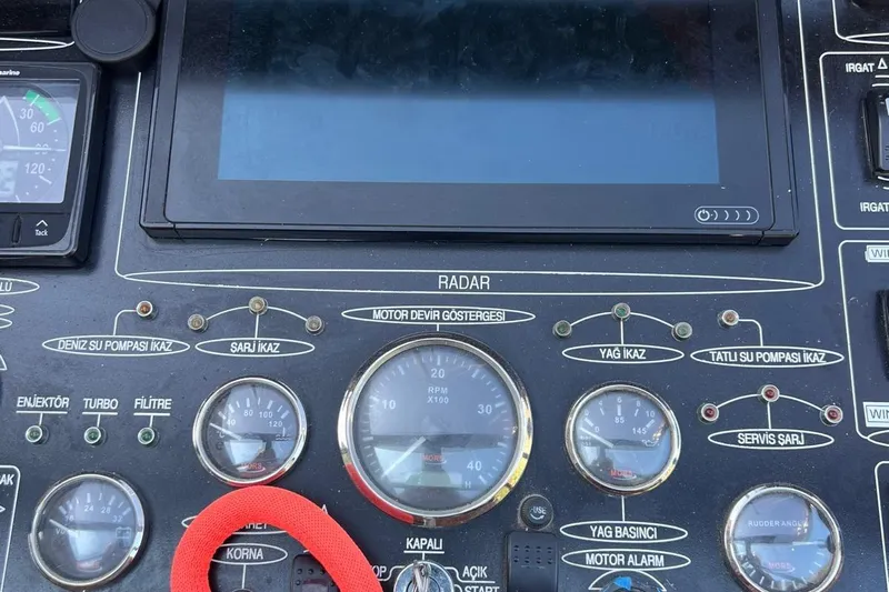  Yacht Photos Pics Control panel of 1993 Custom Sailing Yacht Ocean Pure with gauges and radar display.