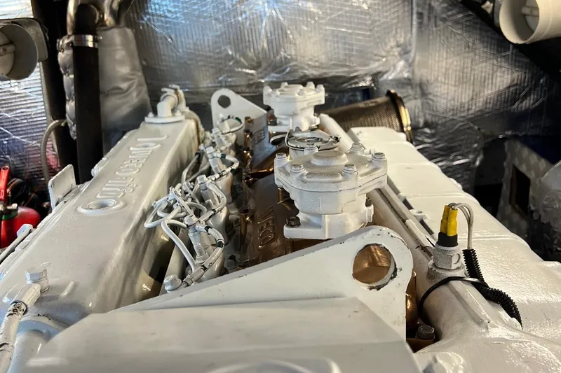  Yacht Photos Pics Engine room of 1993 Custom Sailing Yacht Ocean Pure, showcasing detailed machinery components.