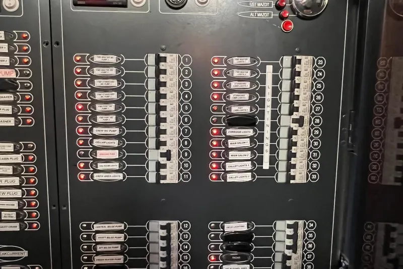  Yacht Photos Pics Electrical control panel on 1993 Custom Sailing Yacht Ocean Pure, featuring labeled switches and indicators.