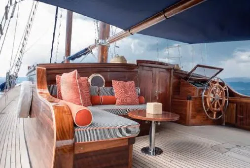  Yacht Photos Pics Luxurious 1993 Custom Sailing Yacht Ocean Pure with elegant wooden deck and plush seating.