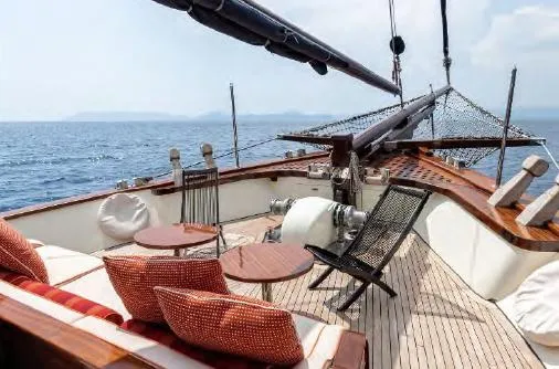  Yacht Photos Pics Luxurious deck of 1993 Custom Sailing Yacht Ocean Pure with elegant seating and ocean view.