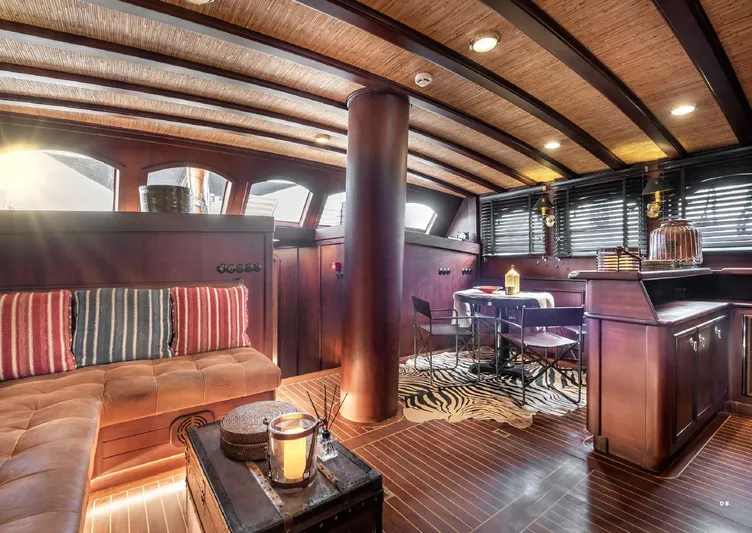  Yacht Photos Pics Luxurious interior of 1993 Custom Sailing Yacht Ocean Pure with elegant wood finishes and cozy seating.