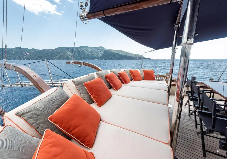  Yacht Photos Pics Luxurious deck of 1993 Custom Sailing Yacht Ocean Pure with plush seating and ocean view.