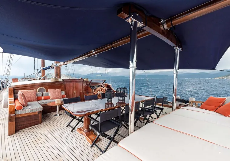  Yacht Photos Pics Luxurious deck of 1993 Custom Sailing Yacht Ocean Pure with elegant seating and ocean view.
