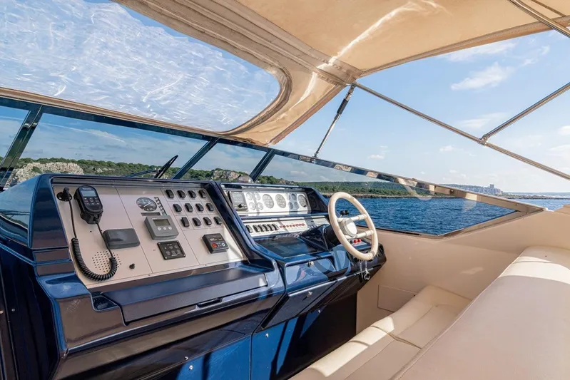 Yacht Photos Pics Cockpit of 1996 Riva BAHAMAS 60 SPECIAL yacht with ocean view and navigation controls.