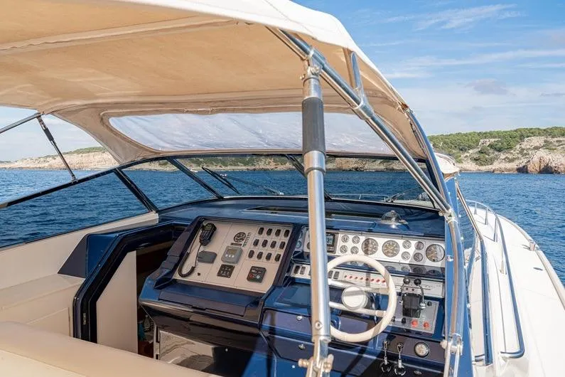  Yacht Photos Pics Cockpit view of 1996 Riva BAHAMAS 60 SPECIAL yacht on open sea.
