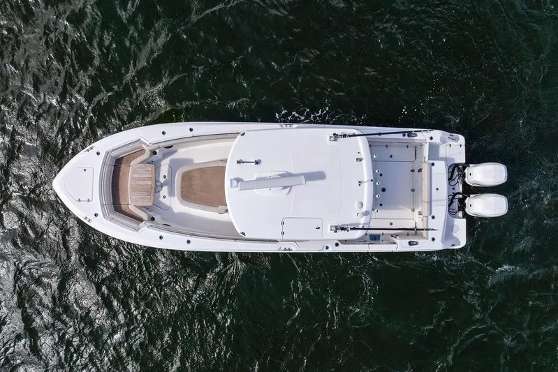  Yacht Photos Pics Aerial view of 2018 Boston Whaler 330 Outrage boat on water.