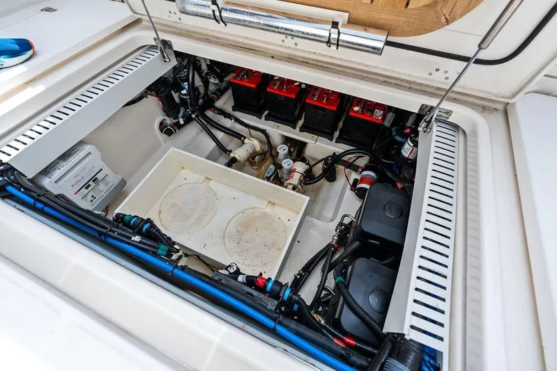  Yacht Photos Pics 2018 Boston Whaler 330 Outrage engine compartment with batteries and wiring.