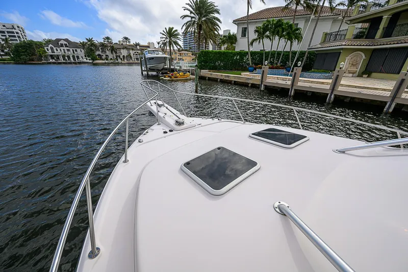  Yacht Photos Pics 2008 Grady-White Express 360 boat on a scenic waterfront with luxury homes.