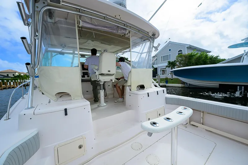  Yacht Photos Pics 2008 Grady-White Express 360 boat interior with helm and seating area.