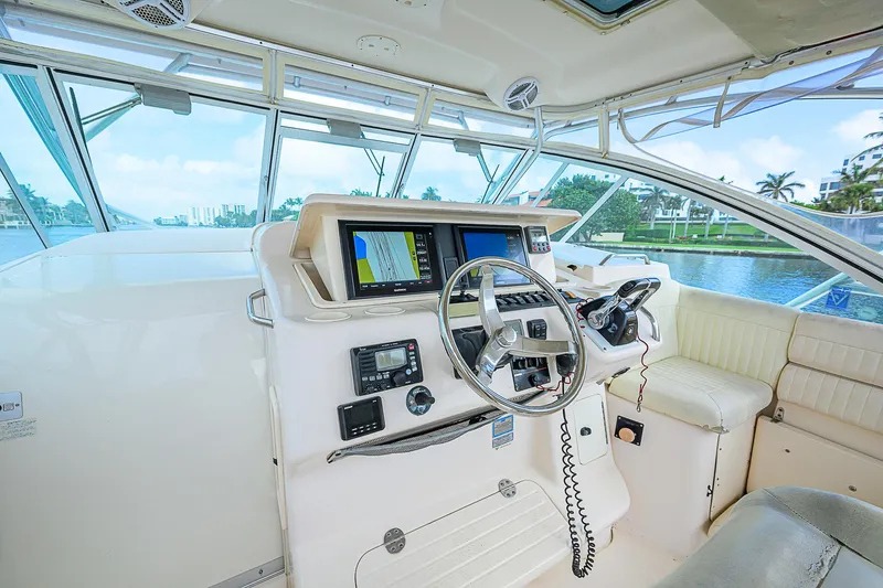  Yacht Photos Pics 2008 Grady-White Express 360 helm with modern navigation equipment and comfortable seating.