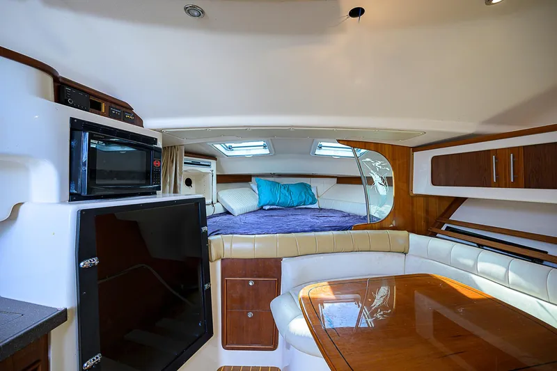  Yacht Photos Pics Luxurious 2008 Grady-White Express 360 cabin interior with bed, seating, and modern amenities.
