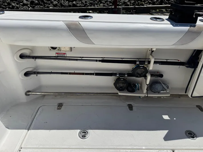  Yacht Photos Pics 2008 Boston Whaler 285 Conquest fishing rod storage with reels on deck.