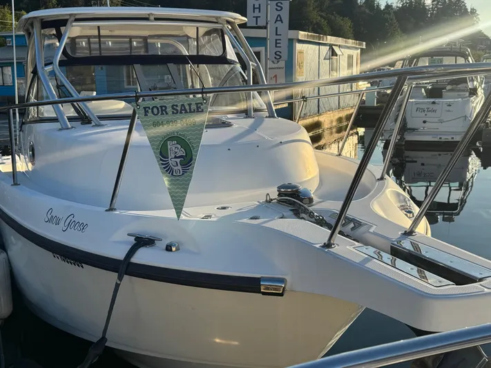  Yacht Photos Pics 2008 Boston Whaler 285 Conquest boat for sale at marina, named "Snow Goose."