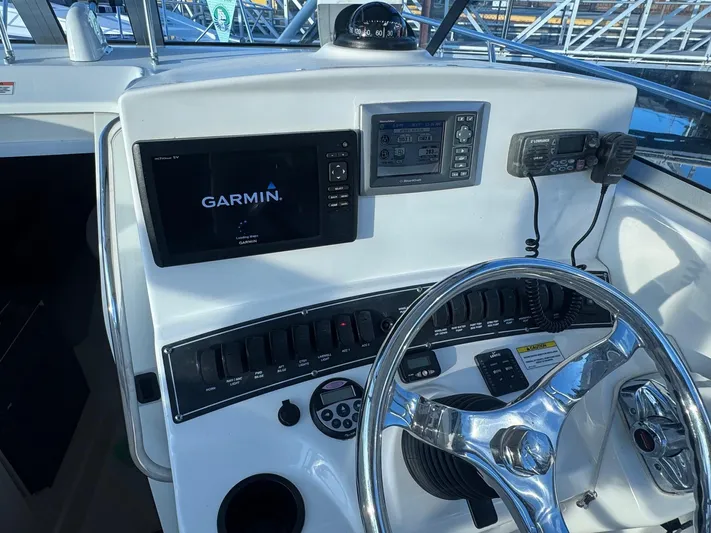  Yacht Photos Pics Control panel of a 2008 Boston Whaler 285 Conquest with Garmin navigation system.