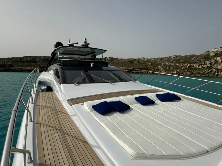Altvs Yacht Photos Pics Luxury 2020 PerMare Amer F100 yacht with sunbathing deck on turquoise water.