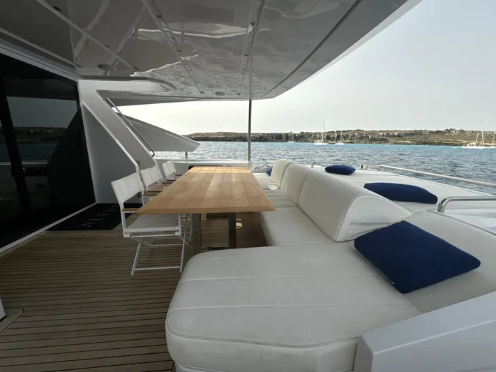 Altvs Yacht Photos Pics Luxurious 2020 PerMare Amer F100 yacht deck with elegant seating and ocean view.