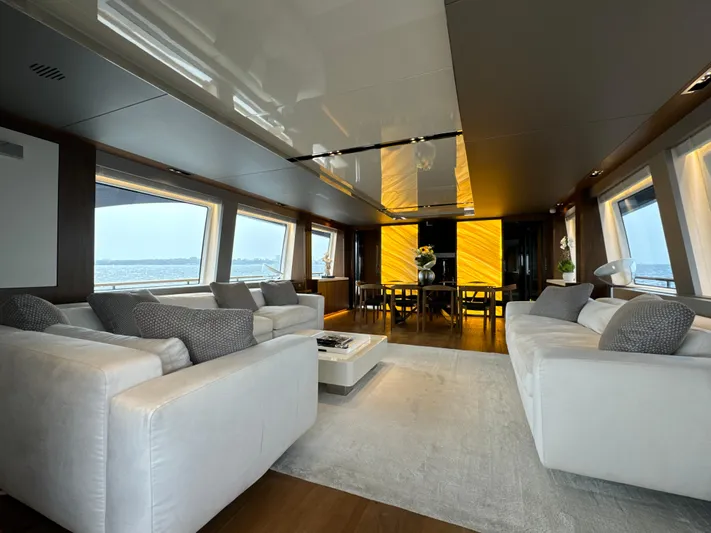 Altvs Yacht Photos Pics Luxurious interior of 2020 PerMare Amer F100 yacht with modern seating and large windows.