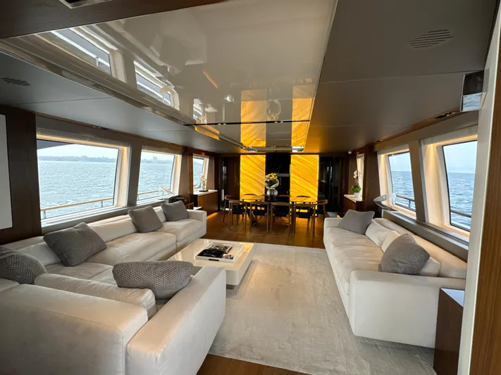 Altvs Yacht Photos Pics Luxurious interior of 2020 PerMare Amer F100 yacht with elegant seating and ocean views.