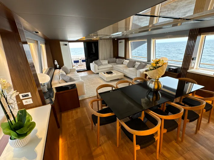 Altvs Yacht Photos Pics Luxurious interior of 2020 PerMare Amer F100 yacht with elegant dining and seating areas.
