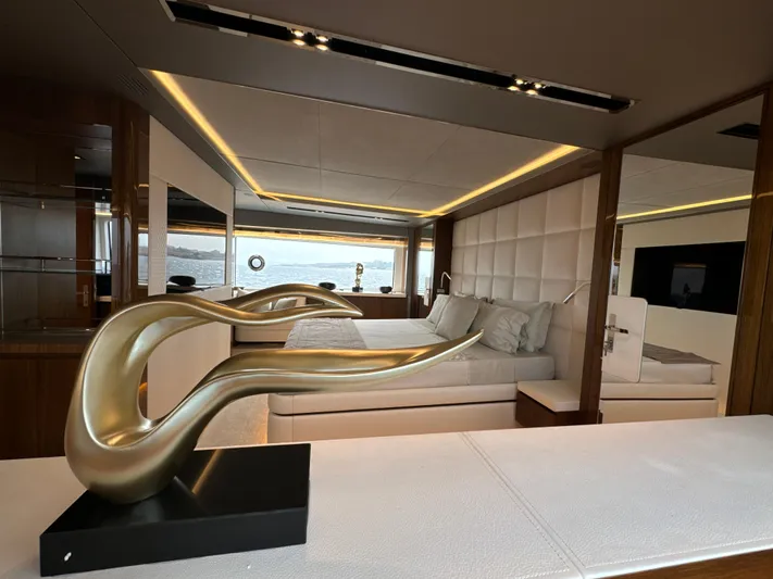 Altvs Yacht Photos Pics Luxurious interior of 2020 PerMare Amer F100 yacht with modern decor and elegant sculpture.