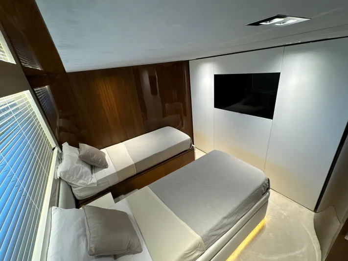 Altvs Yacht Photos Pics Luxurious twin bedroom on 2020 PerMare Amer F100 yacht with modern decor and TV.