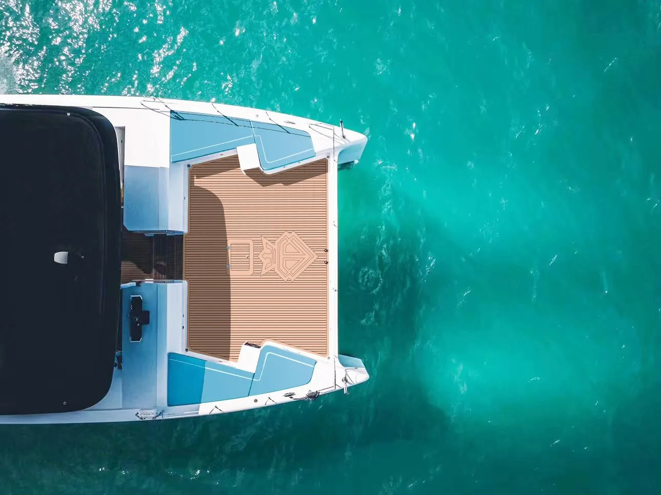 2024 Diamond Yachts P55 Power Catamaran on turquoise water.