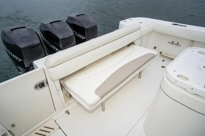 Luna Dei Pescatori Yacht Photos Pics 2009 Boston Whaler 345 Conquest boat with foldable seating and triple Mercury outboard engines.