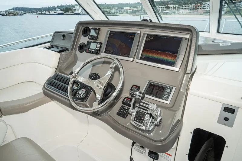 Luna Dei Pescatori Yacht Photos Pics 2009 Boston Whaler 345 Conquest helm with advanced navigation and control systems.