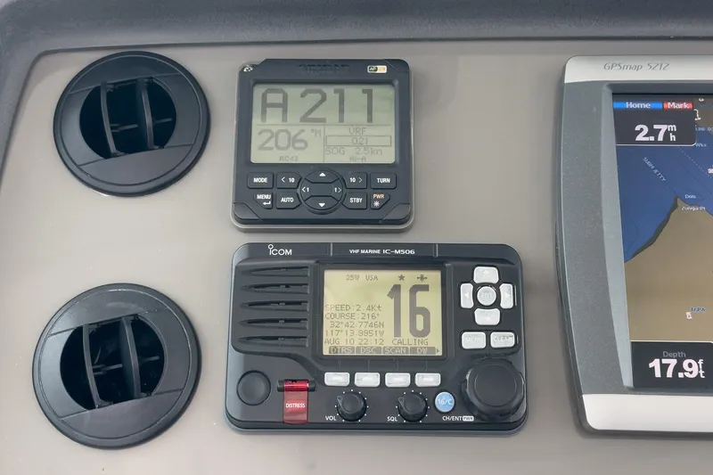 Luna Dei Pescatori Yacht Photos Pics Control panel of a 2009 Boston Whaler 345 Conquest with navigation instruments.