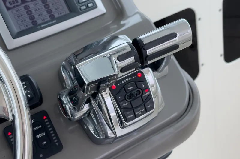 Luna Dei Pescatori Yacht Photos Pics Control panel of a 2009 Boston Whaler 345 Conquest boat with throttle levers.