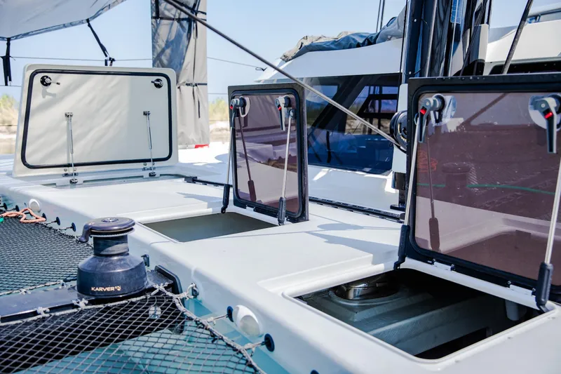  Yacht Photos Pics 2022 HH Catamarans HH55 deck with open hatches and winch system.
