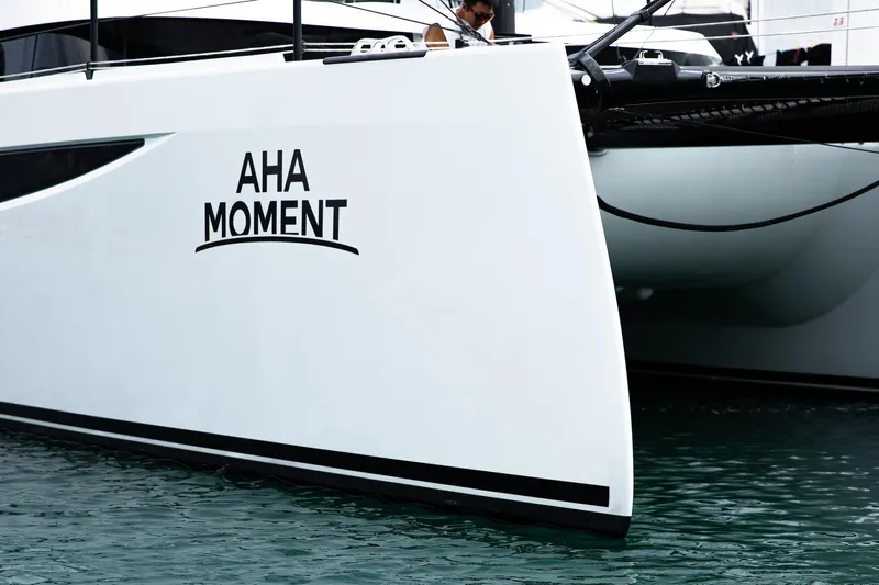  Yacht Photos Pics 2022 HH Catamarans HH55 "AHA MOMENT" docked on water.